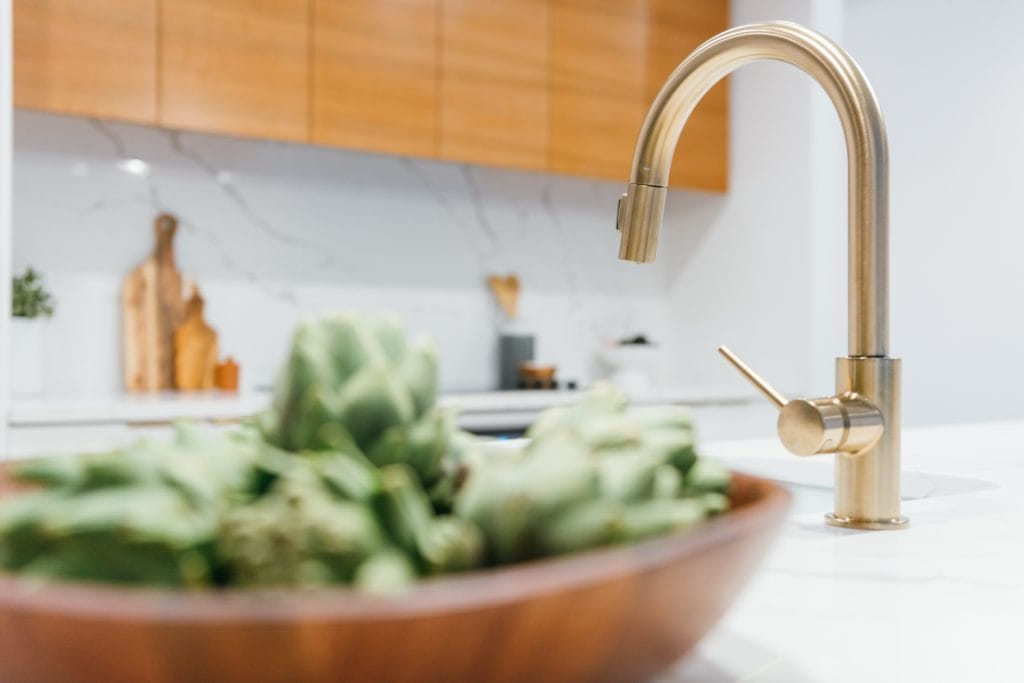 Fort Lauderdale interior designer brass faucet