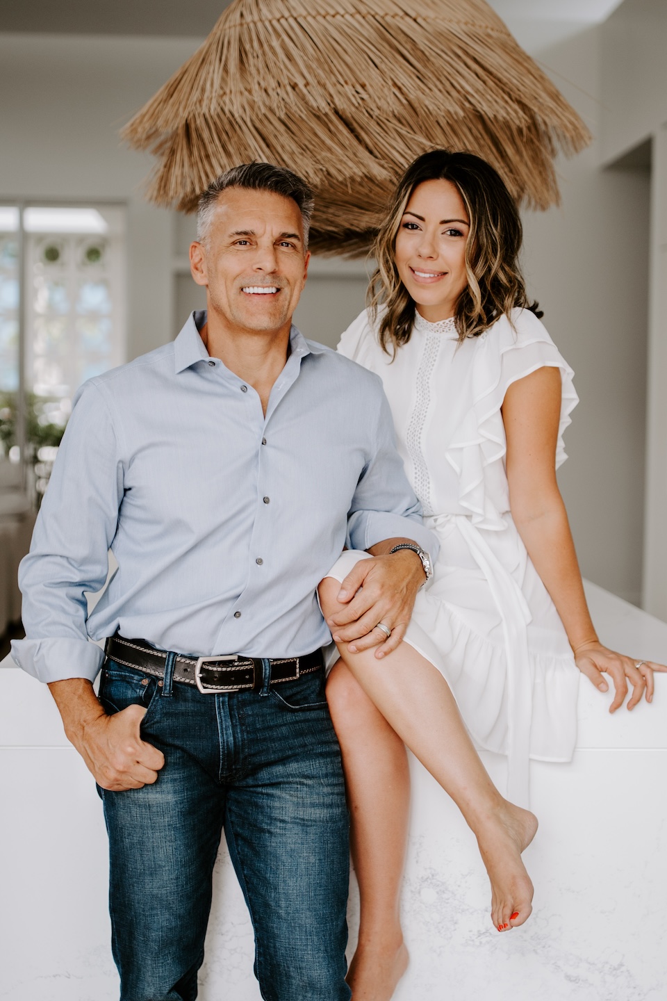 STUDIO 818 founders photographed in a Hobe Sound residence, representing the firm’s luxury interior design and architectural expertise.